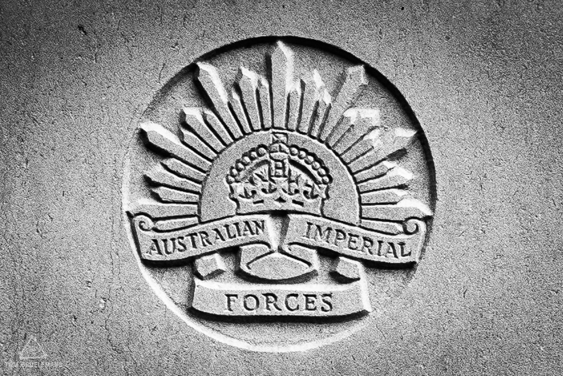 Hooge Crater Cemetery. The emblem of the Australian Imperial Forces on private Sydney Edmund Ellis' gravestone.